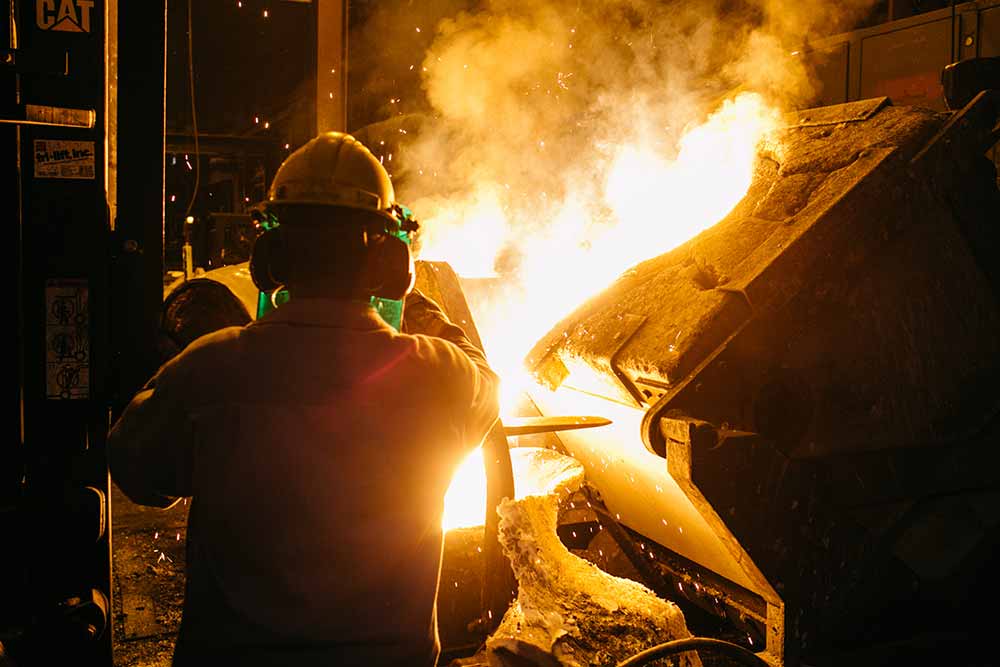 Molten metal poured into casting mold at Taylor & Fenn in Windsor, Connecticut.